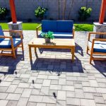 Rear,Pavers,Patio,With,Couch,,Table,And,Two,Chairs